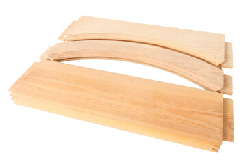 wooden blanks for assembling doors, processed by a milling machine, on a white surface