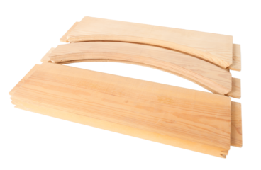 wooden blanks for assembling doors, processed by a milling machine, on a white surface