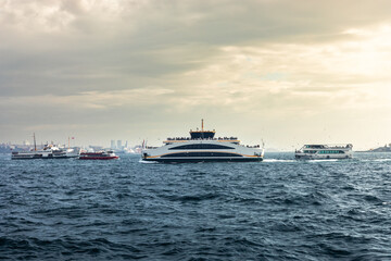 Fototapeta na wymiar Ferry boats at the Bosphorus strait.