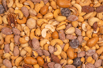 A group of almonds, pistachios, walnuts, macadamia, cashews.