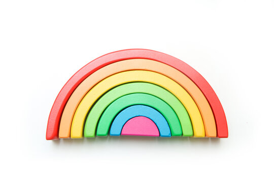 The wooden rainbow toy for children isolated in a white background. 