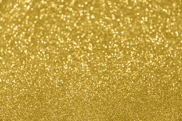 Glitter sparkling gold bokeh background