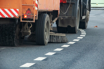 A special car cleans the road closeup