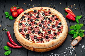 Big and tasty pizza with different types of meat