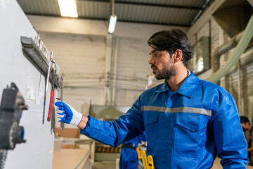 Carpenter making furniture in workshop