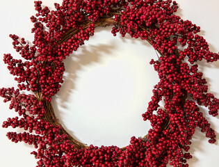 Holiday Red Berry Wreath on a White Background
