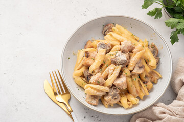 Pasta with chicken and cream mushroom sauce