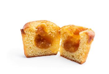 Freshly baked muffins with apricot jam filling isolated on white