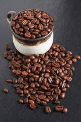 Coffee beans in cup