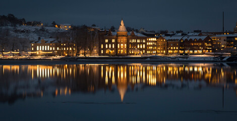 View of the city and an embankment winter evening