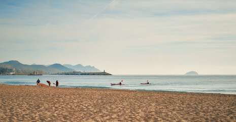 African American family on the beach on the weekend