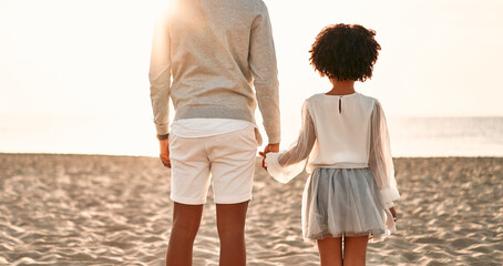 African American family on the beach on the weekend