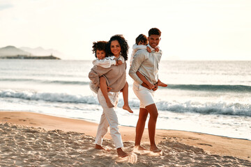 African American family on the beach on the weekend