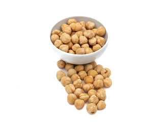 bowl of hazelnuts on white background 