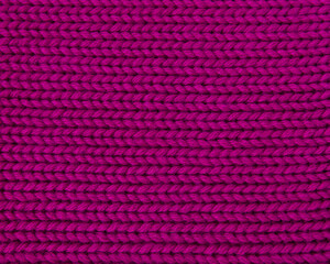 Woolen pink knitted warm texture fabric background
