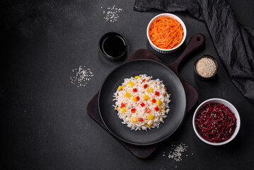 Tasty Asian dish of rice, pepper, spices and herbs