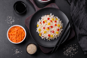 Tasty Asian dish of rice, pepper, spices and herbs
