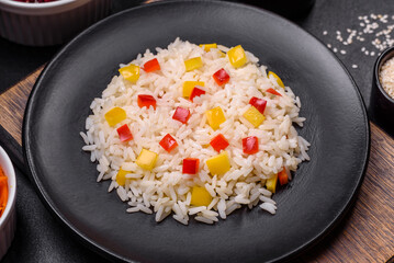 Tasty Asian dish of rice, pepper, spices and herbs