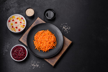 Tasty spicy Korean carrot with spices and herbs