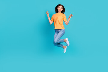 Full length photo of pretty cute glad lady wear trendy denim clothes hooray black friday empty space isolated on blue color background