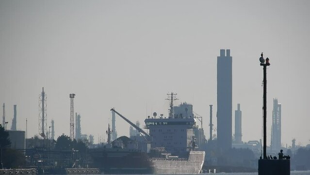 Slow Pan Up Ship In Industrial Shipyard Background Backdrop Overcast Cloudy Sky