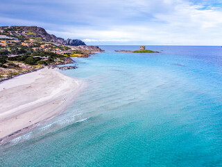 Fototapeta premium Aerial view of La Pelosa beach under a grey sky