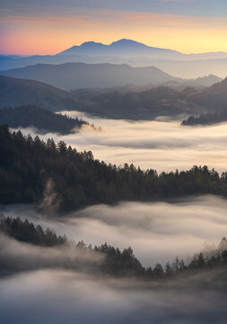 A spectacular sunrise above the fog. Taken in Northern California.