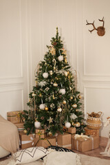 Artificial Christmas tree decorated with toys