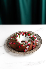 Christmas cupcakes with icing and berries