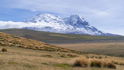 Amazing Antisana volcano, volcanic landscape in the ecological park, road in the mountains