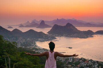 silhouette of a person in the mountains