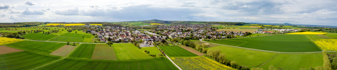 Fototapeta na wymiar Panorama from small village surrounded by Meadows