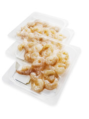 Fresh uncooked prawn or shrimp on plastic tray, white background. Premium high quality seafood product.