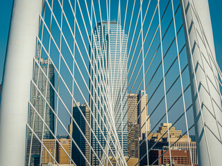 Aerial of Downtown Dallas Skyline seen through the Margaret Hunt Hill Bridge