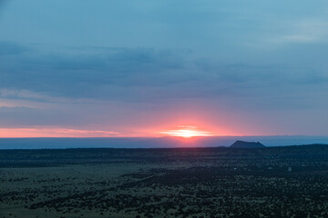 Sunrise over the San Francisco Volcano field in Arizona on a cloudy morning from an elevate position.