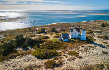 Aerial photo of lighthouse and on dunes of Cape Cod