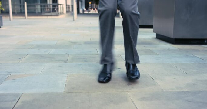 Dance, comic and legs of an excited businessman, city energy and freedom from work in the street of Colombia. Success, celebration and feet of a corporate employee winning, dancing and happy