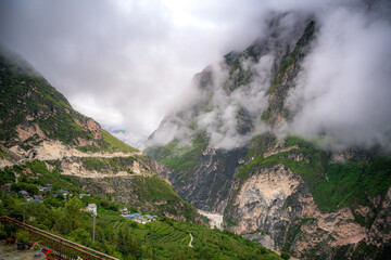 mountain village on tiger leaping gorge trek and the beautiful layer of the mountain after the rain...