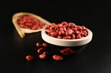 RED Peanuts in wooden Peanuts in a bowl isolated