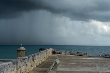 Day of sun and horizon rain cloudly on the walled city of cartagena de indias