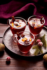 Three Cups of Mulled Winer on a Tray