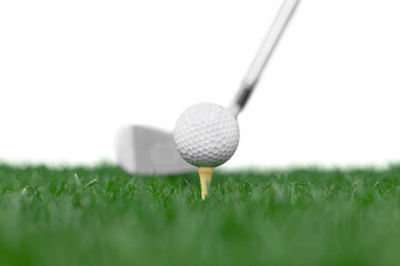 Golf Ball on Tee and Club on Golf Course