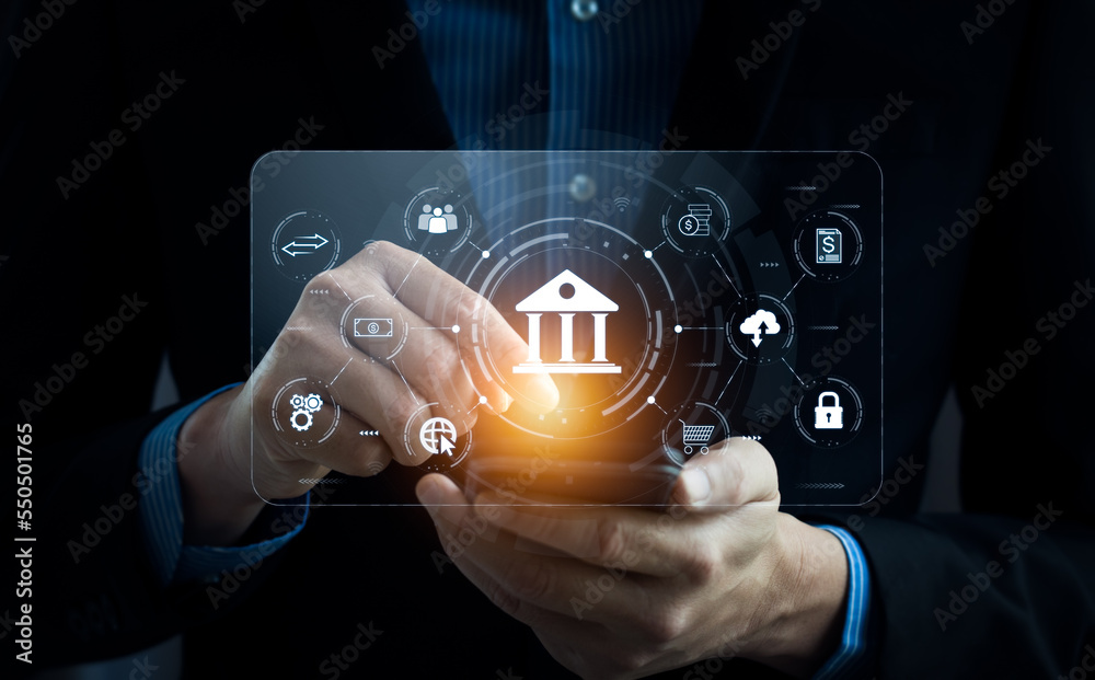 Wall mural Businessman using mobile online banking and payments, digital marketing. Financial and banking networking. Customer network connection and online shopping icons cyber security, business technology