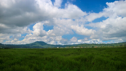 Fototapeta na wymiar beautiful mountains with blue cloudy sky