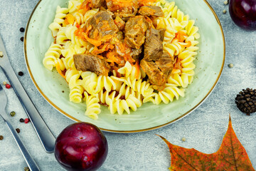 Stewed beef meat with macaroni