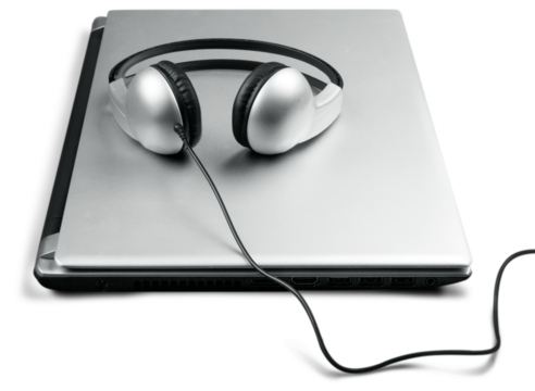 Modern latop and headphones isolated on white