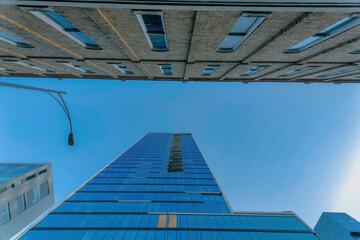 Looking up at exterior of city apartments and street light pole in Austin Texas