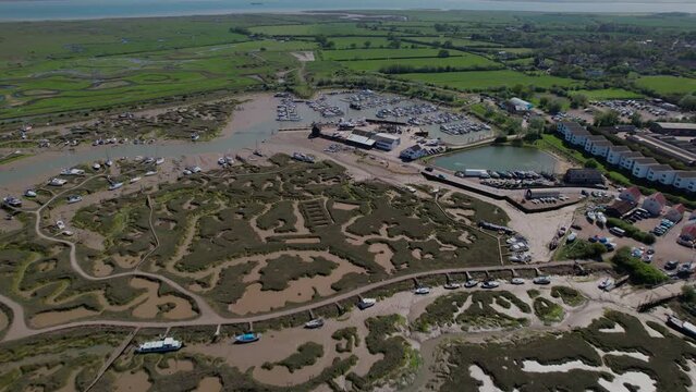 Marshes And Creek In Tollesbury On The Coastline Of Essex In The UK. aerial
