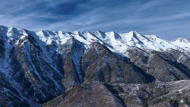 Aerial Mount Nebo summit Utah snow. Beautiful season winter snow on Wasatch mountain forest. Mount Nebo, Central Utah. Canyon valley and trails. Travel destination.