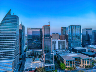 Obraz premium Multi-storey modern financial and residential buildings against the dusk sky at Austin, Texas